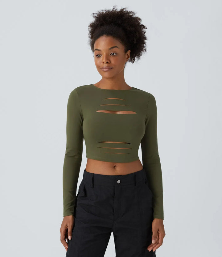 Trendig crop top med långa ärmar och snygga designdetaljer för damkläder
