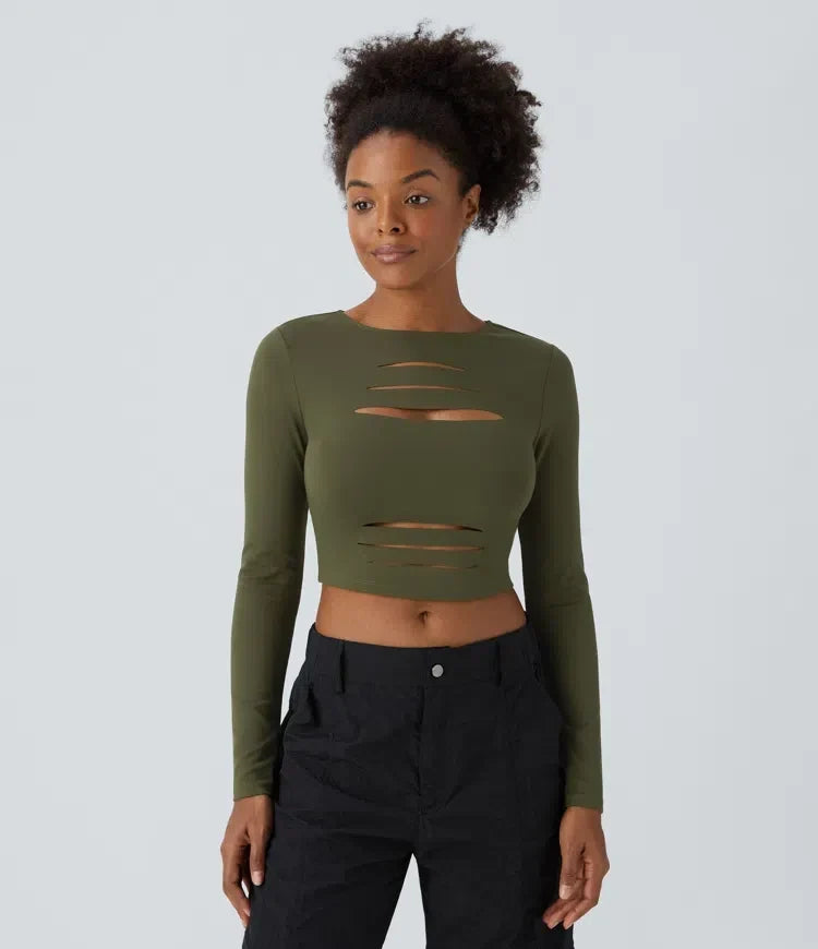 Svart crop top för dam i slim fit med unika utskurna detaljer för en modern look