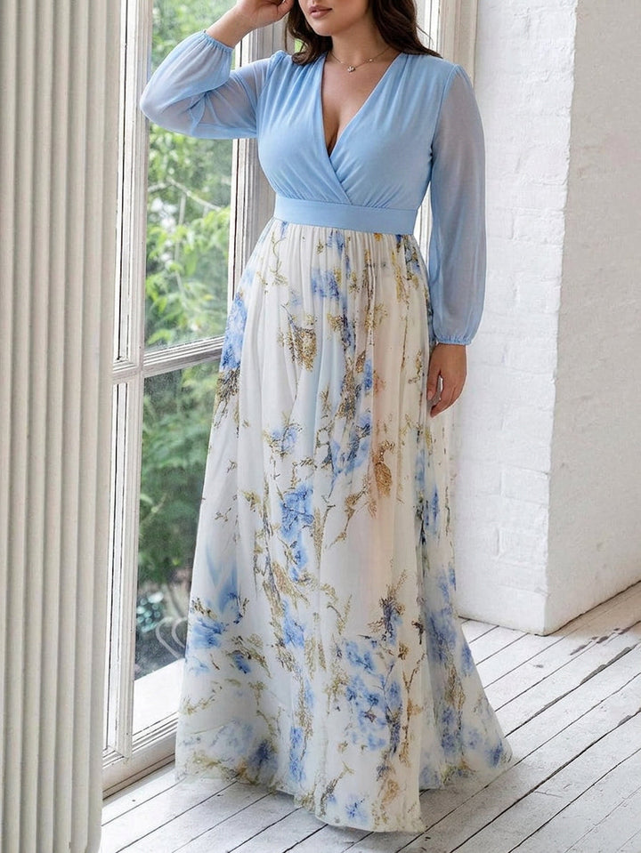 Elegant maxiklänning för dam med lång ärm och blomstermotiv