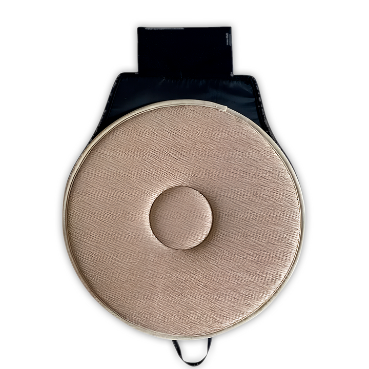 Beige 360 grader roterande sittdyna i rund modell