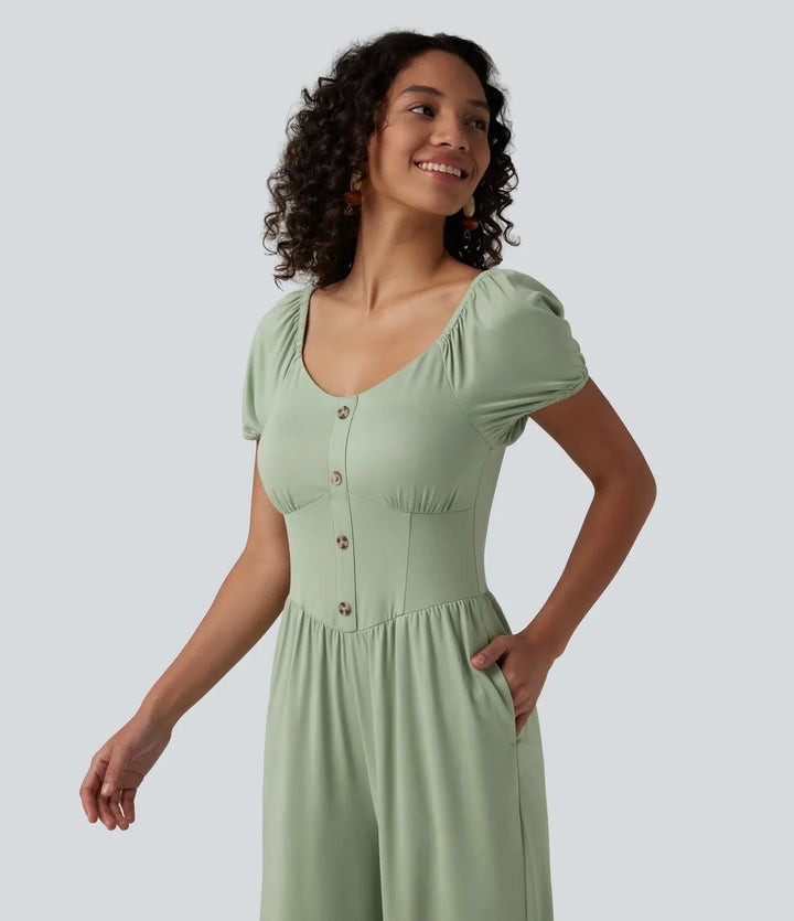 Elegant jumpsuit för dam med korsettliv och trendiga puffärmar