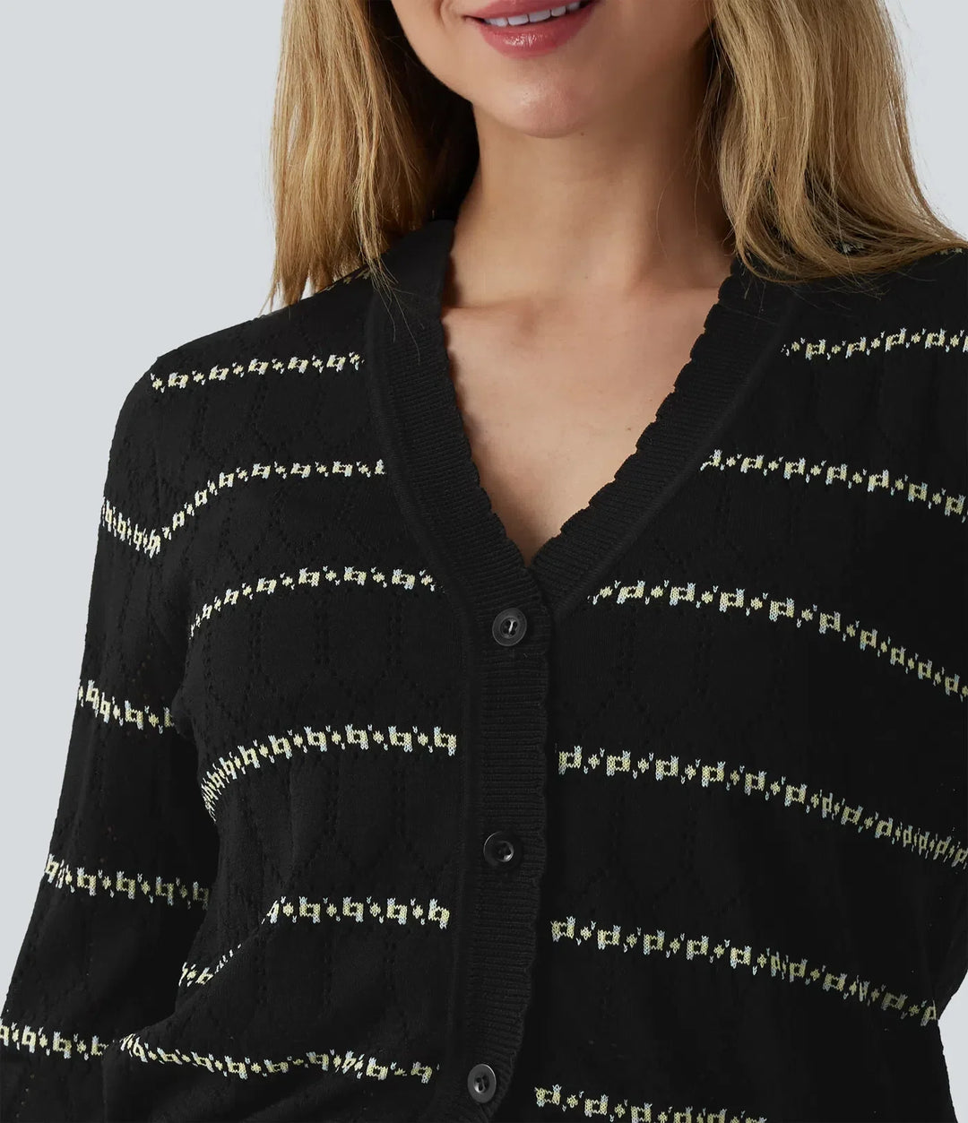 Mörk dam cardigan i v-ringad design med knappar och långa ärmar