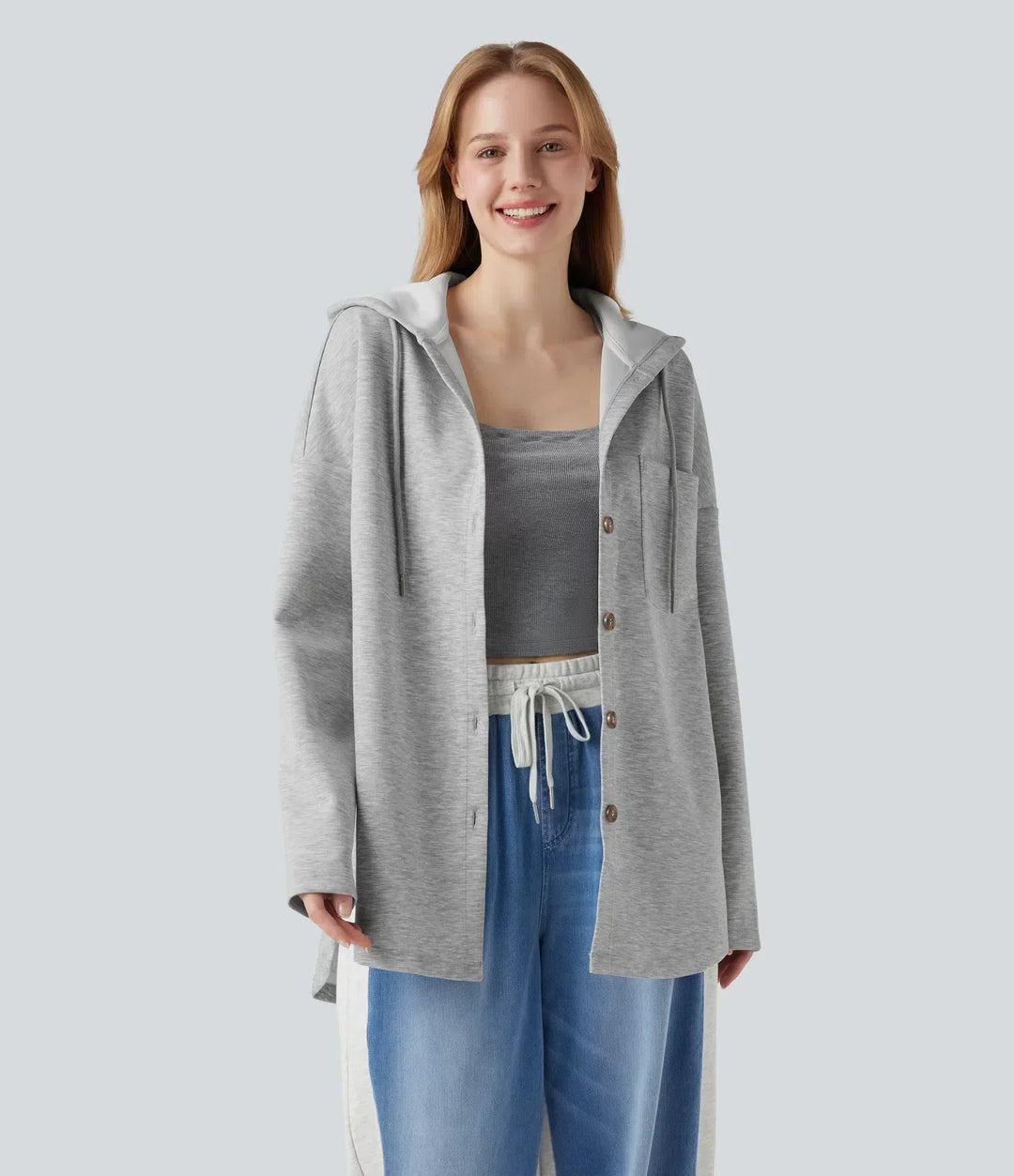 Beige damtröja med huva och dragsko i vardagsstil