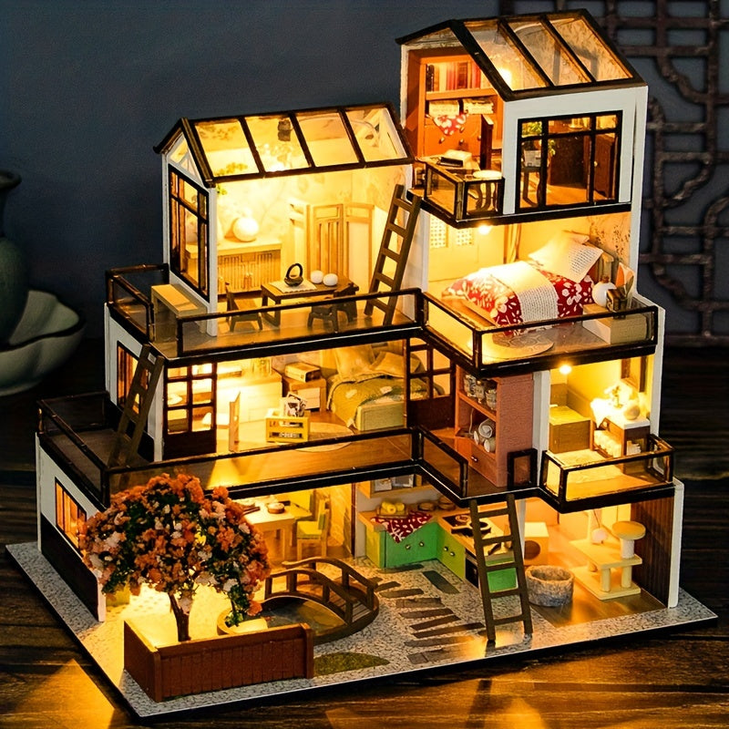 Miniatyrvilla med varmt LED-belysning tänd i mörker för mysig stämning