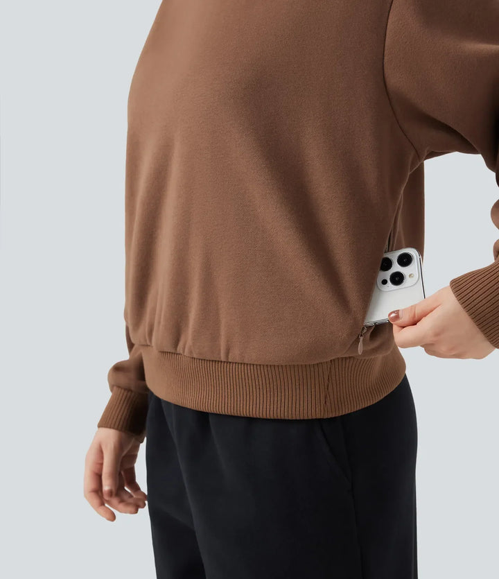 Beige dam sweatshirt med lång ärm och praktiska sidofickor