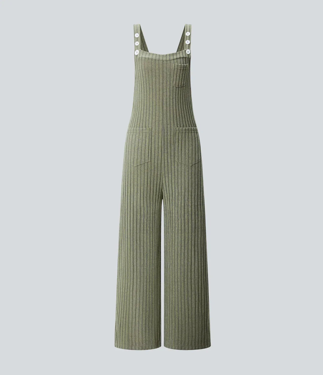 Detaljbild på tyg och textur i ribbstickad damoverall med ficka
