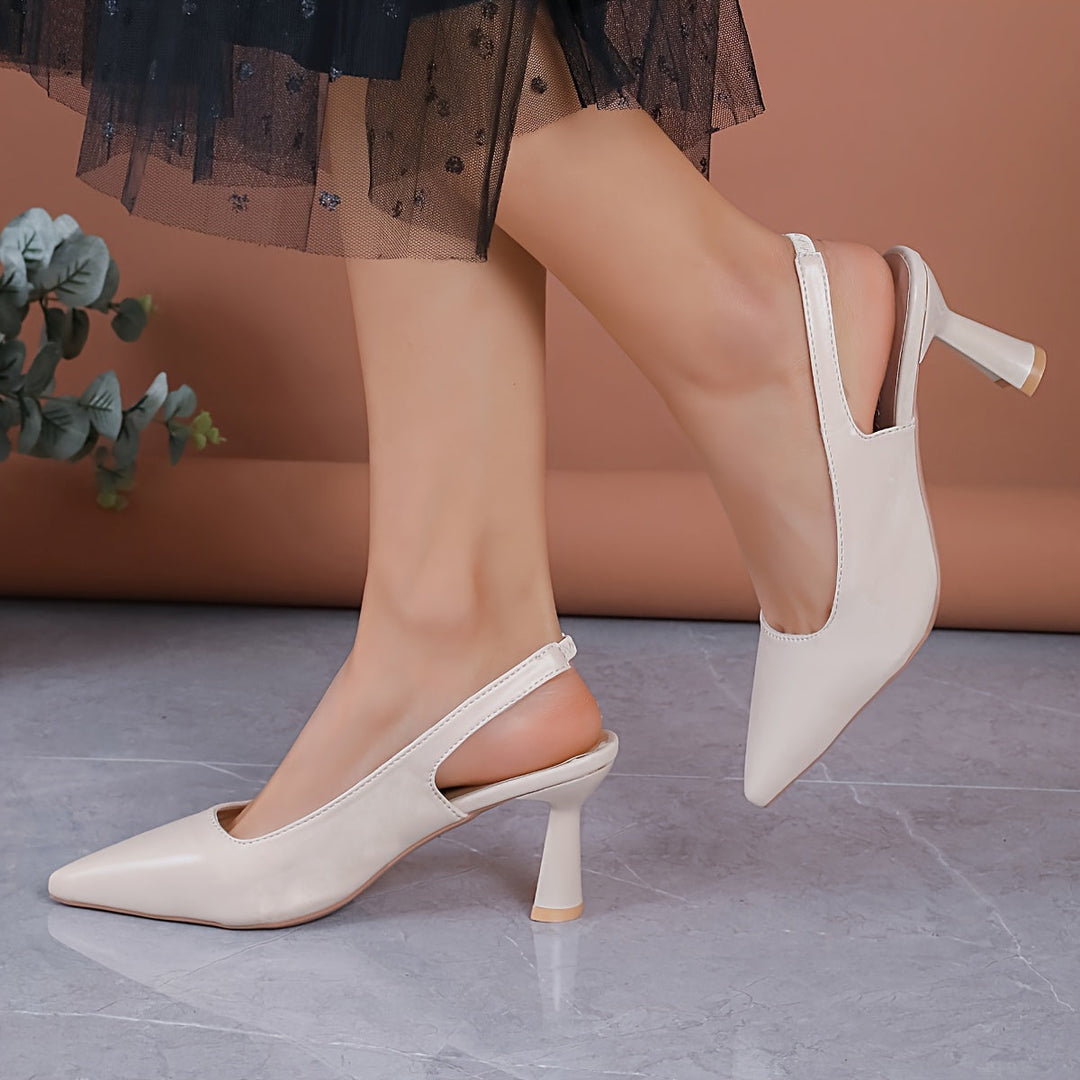 Klassiska damskor med klack, spetsig tå och slingback-design