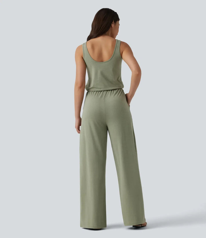 Baksida av den ärmlösa gröna vardagsjumpsuiten för damer