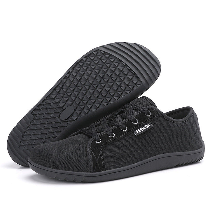 Svart zero-drop sneaker med sula och ovandel