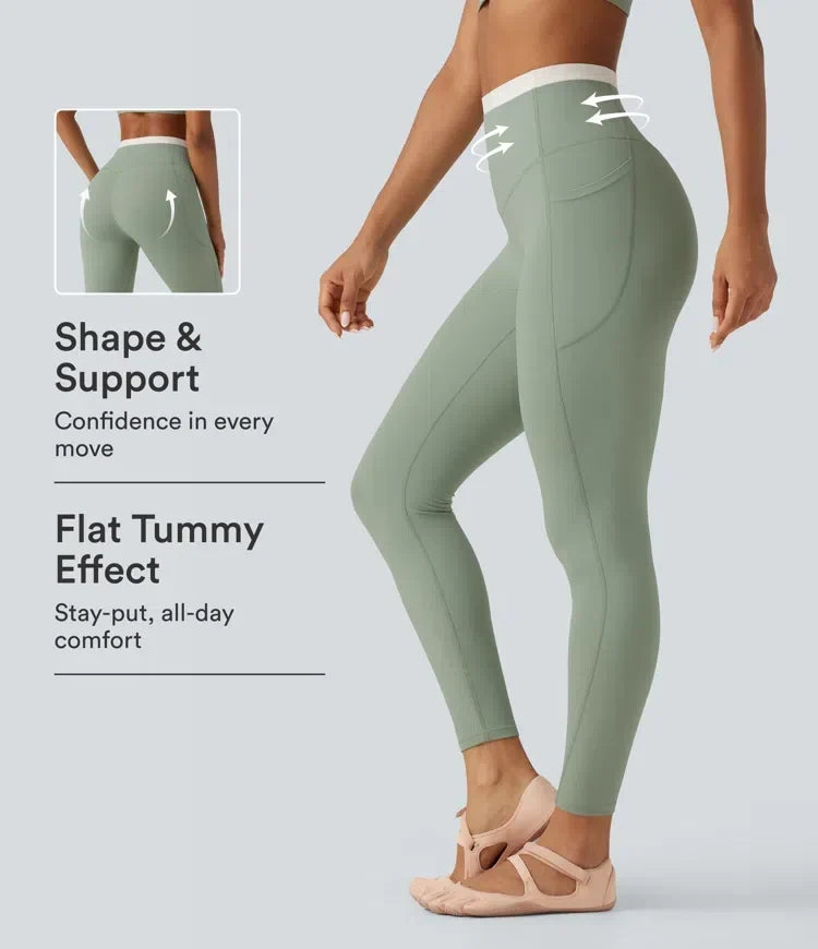 Modell i gröna högmidjade yogaleggings med sidofickor bakifrån