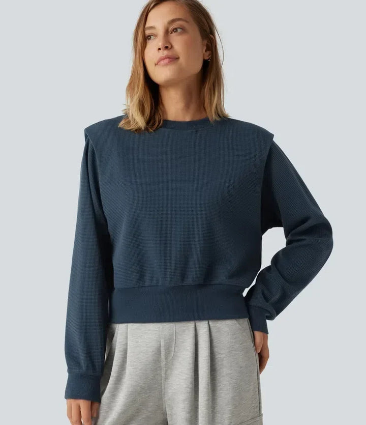 Dam sweatshirt med våffelstruktur framifrån i mörkblå färg