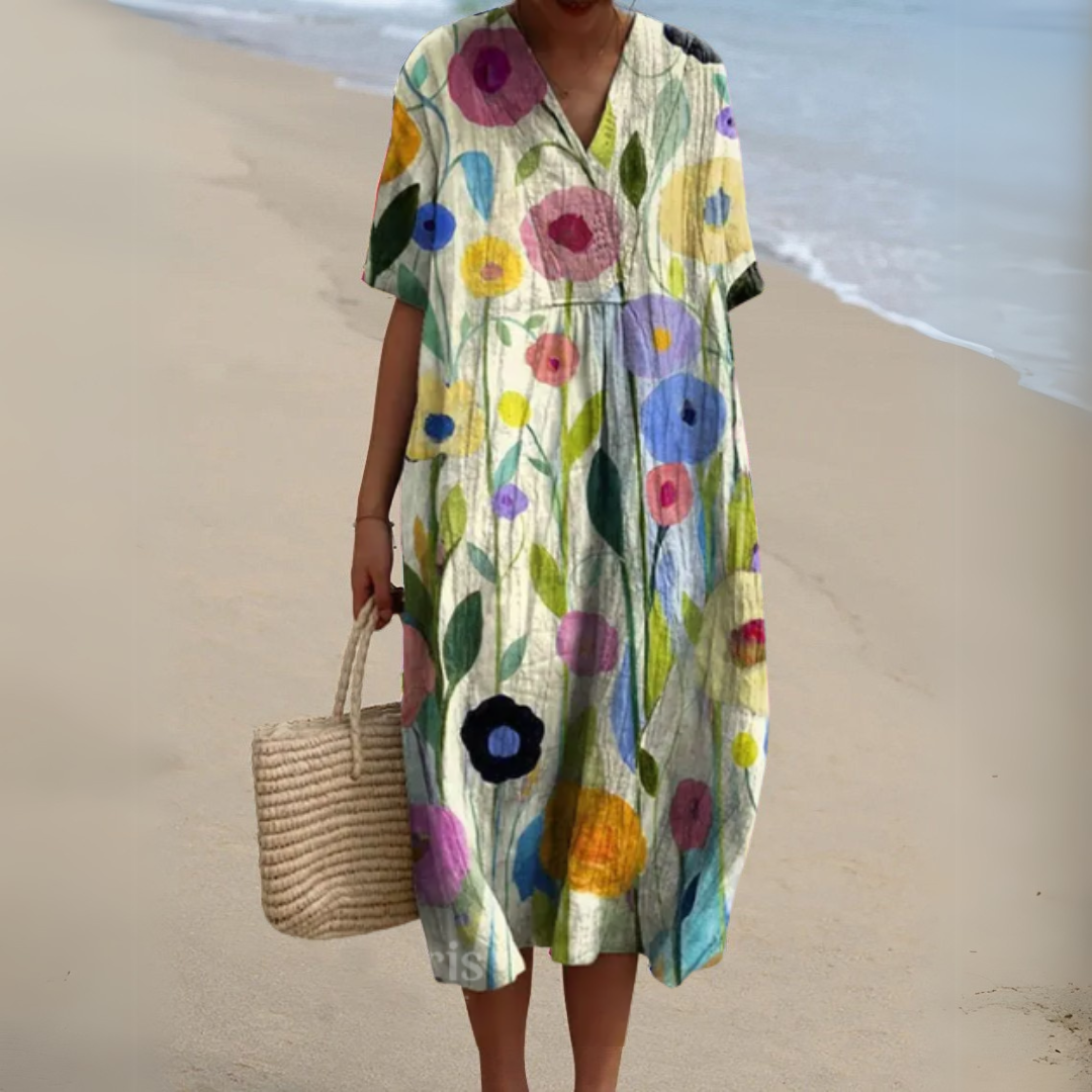 Bekväm strandklänning med blommotiv och v-ringning
