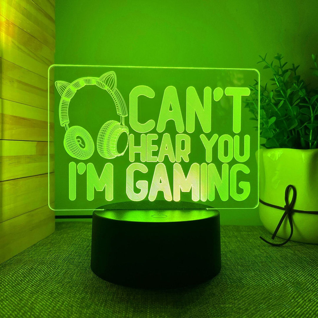 Detaljbild på 3D LED-lampa med gaming-motiv och bas