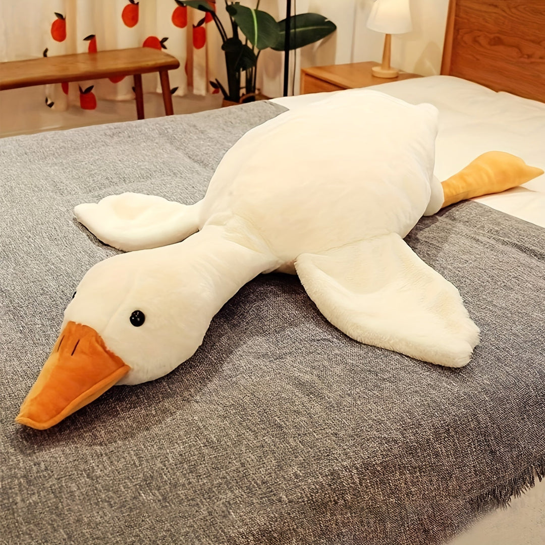 Visning av den långa gåskudden uppredd i en spjälsäng