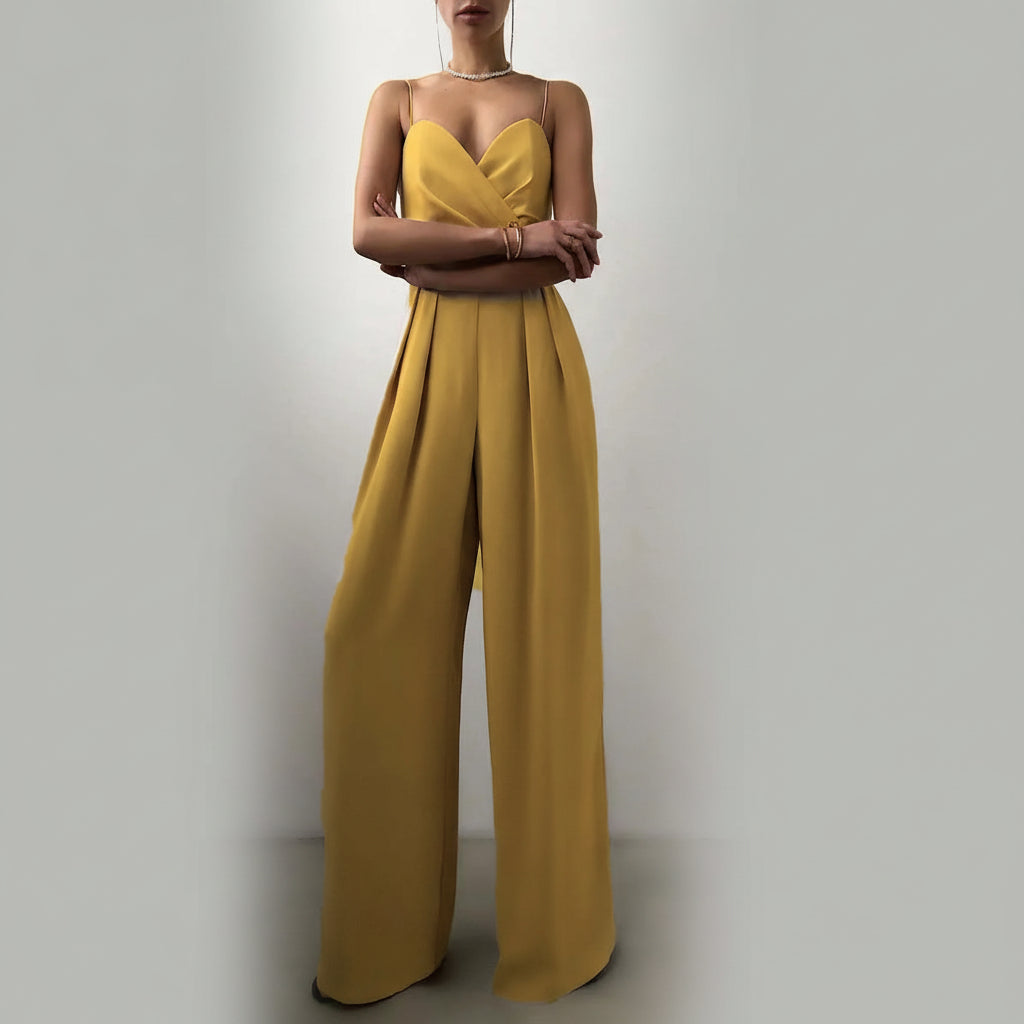 Stilren jumpsuit med vida ben och skärp i midjan för dam