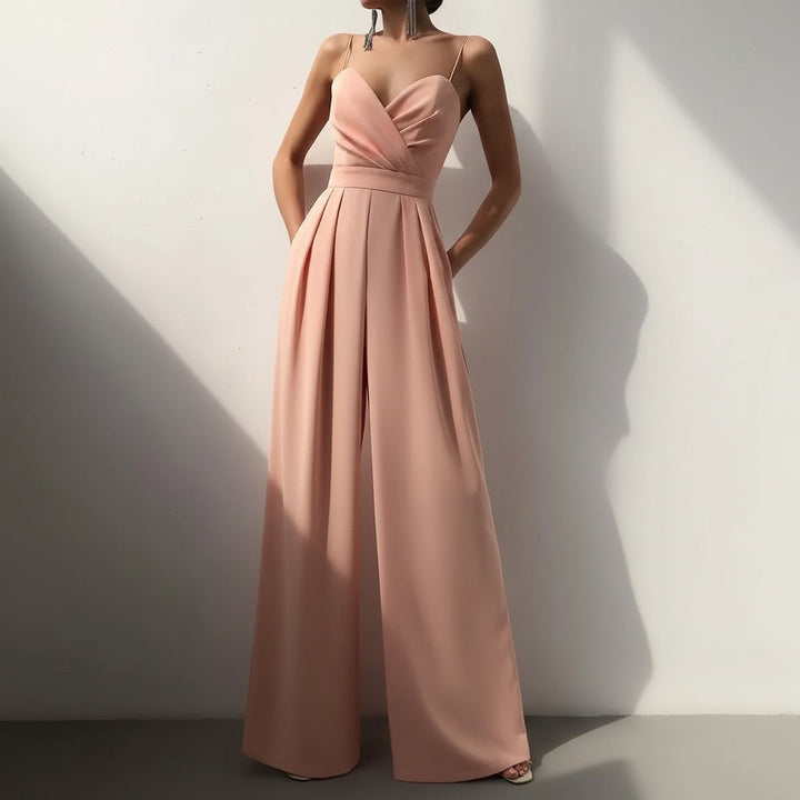 Elegant rosa ärmlös jumpsuit med V-ringning och hög midja
