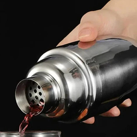 Elegant barsked och muddler i metall för perfekta drinkar
