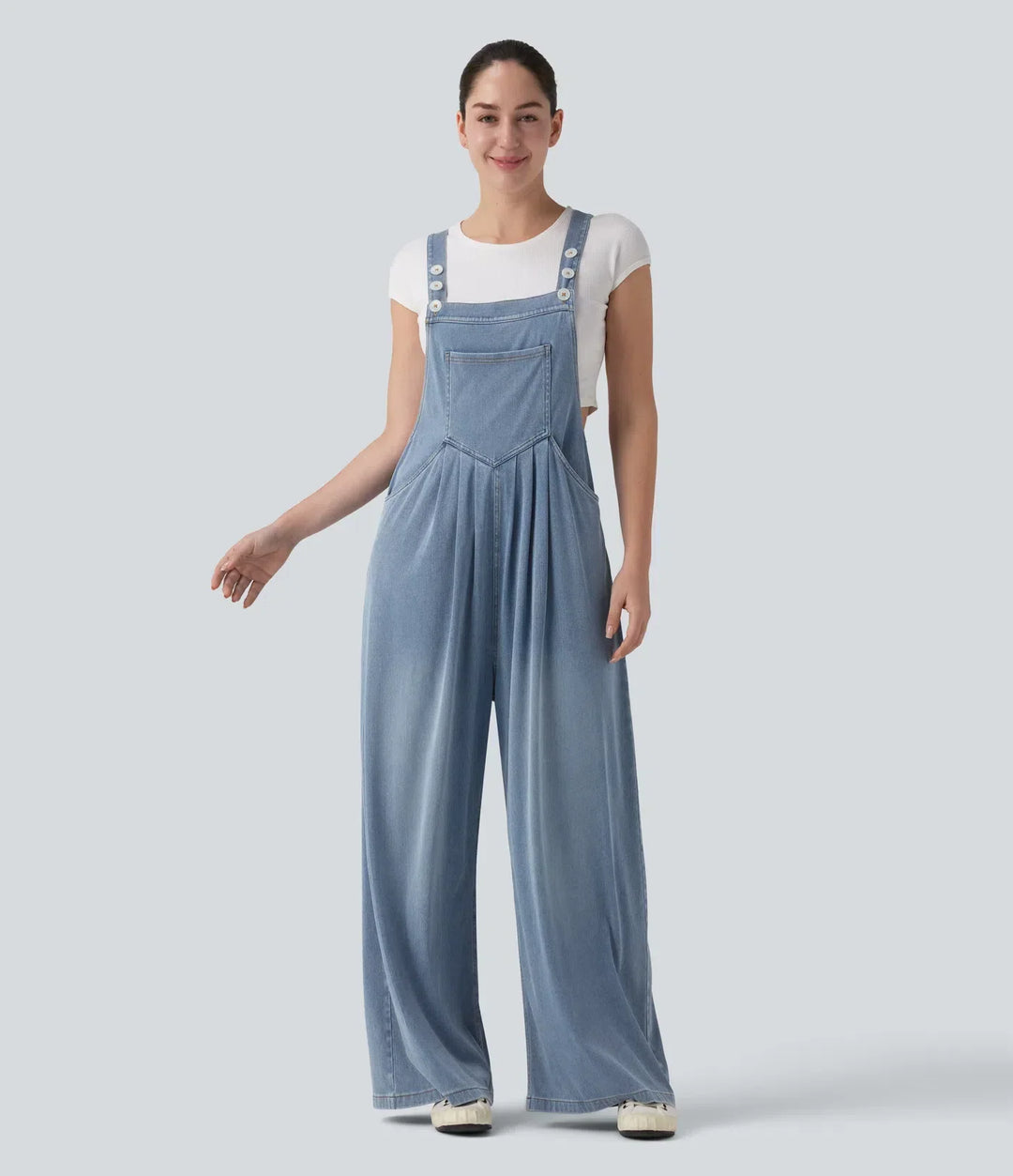 Avslappnad stil på draperad overall för damer i trendig vardagslook