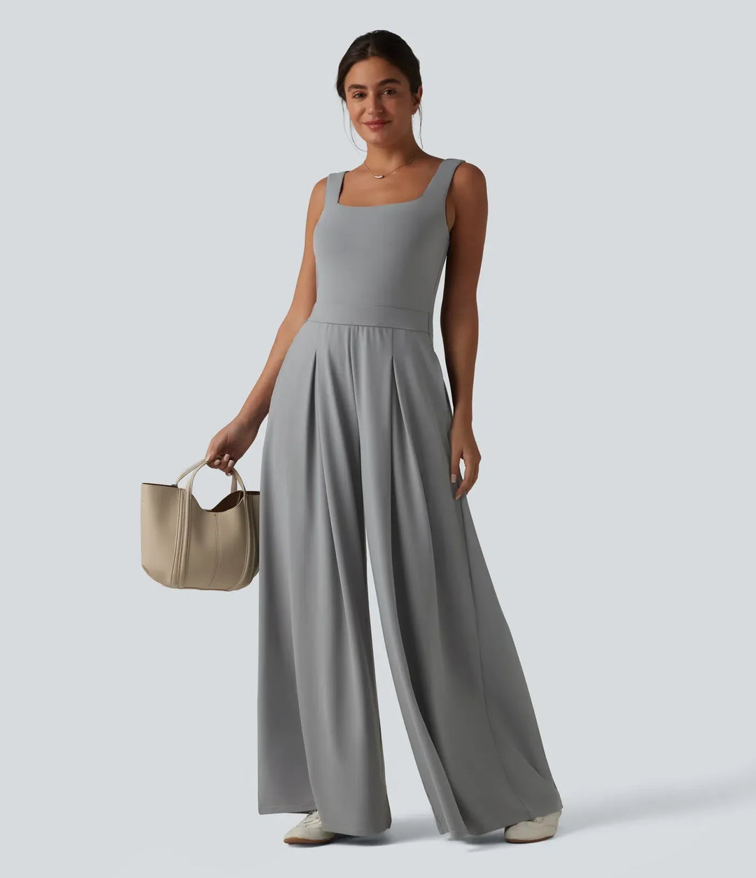 Stilren jumpsuit med vida ben och snygg fyrkantig halsringning