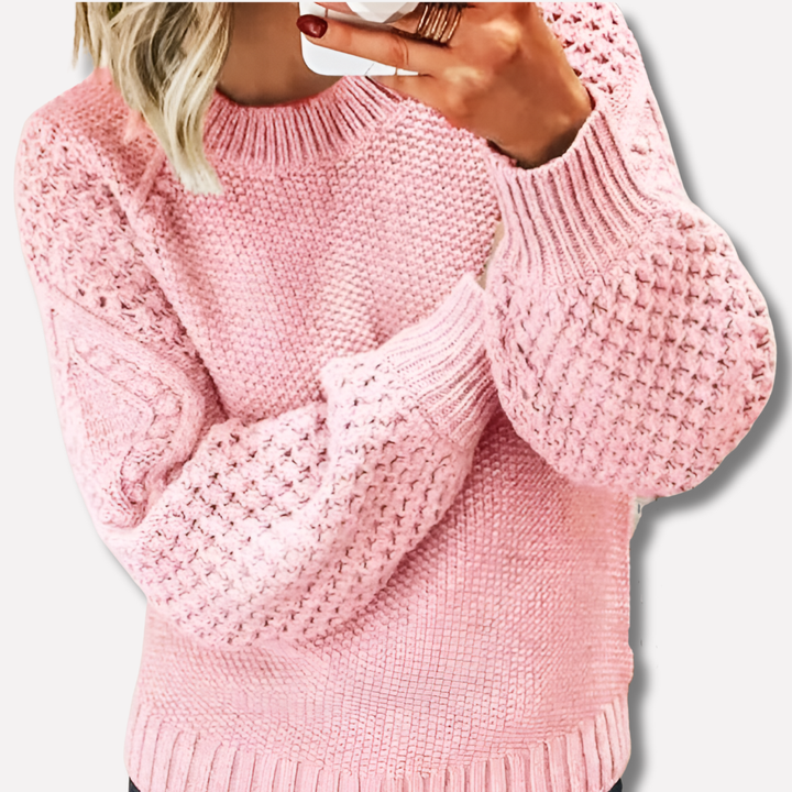 Rosa stickad damtröja i mjukt och värmande tyg