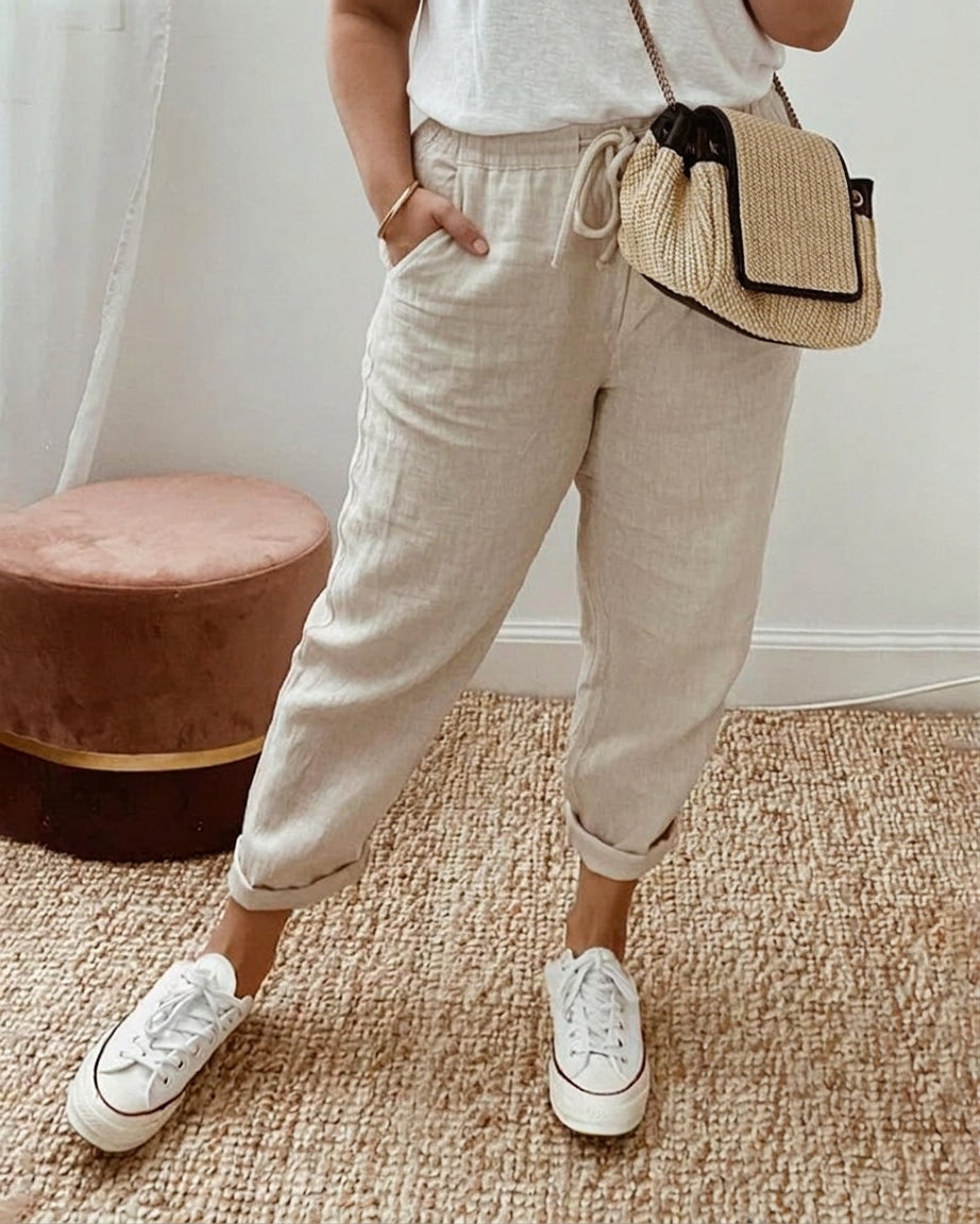 Dambyxor Noa i beige med hög midja och fickor