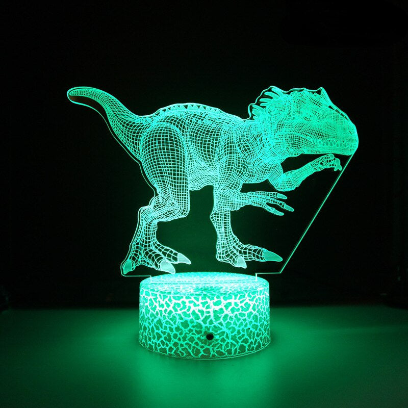 Förpackning och 3D-lampa med dinosaurie-tema redo att ges bort i present