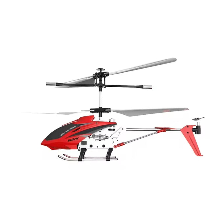 Röd mini RC helikopter med metallram sedd från sidan