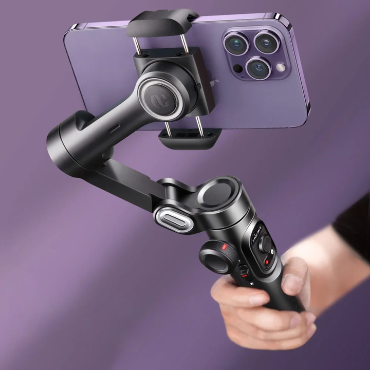 Smartphone gimbal stabilizer i lila mobiltelefon i handen