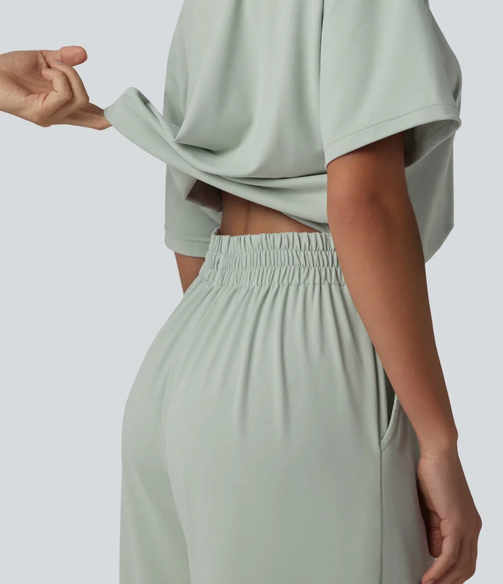 Kortärmad jumpsuit för dam i bekväm vardagsdesign med fin båtringning