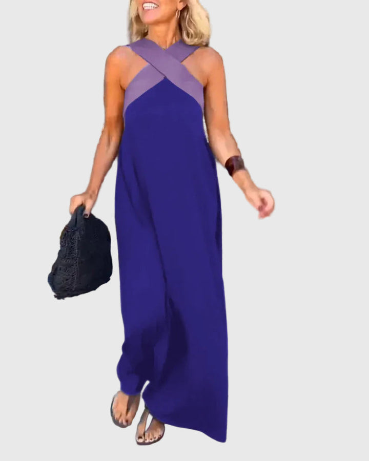 Graciös maxiklänning i helfigur, perfekt inspirerad av svenskt dammode.