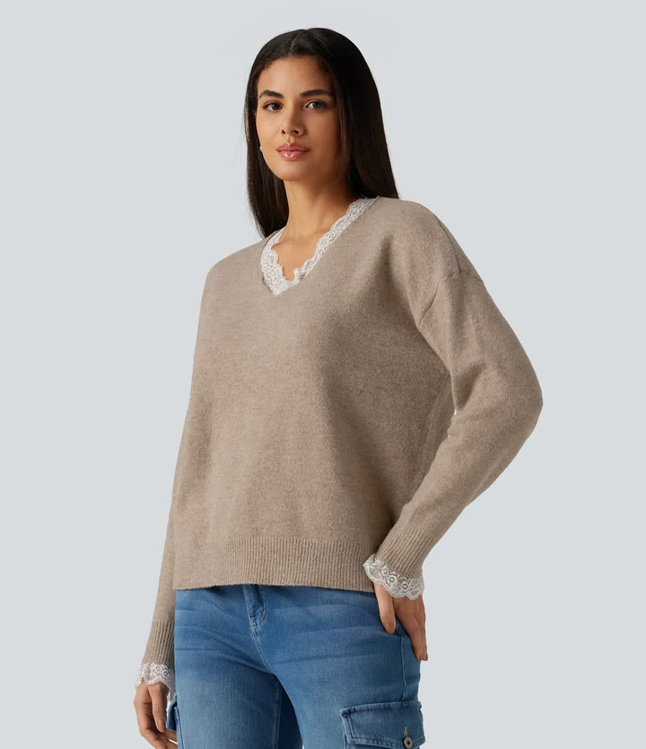Elegant spetskant vid ärmslut på svart damtröja