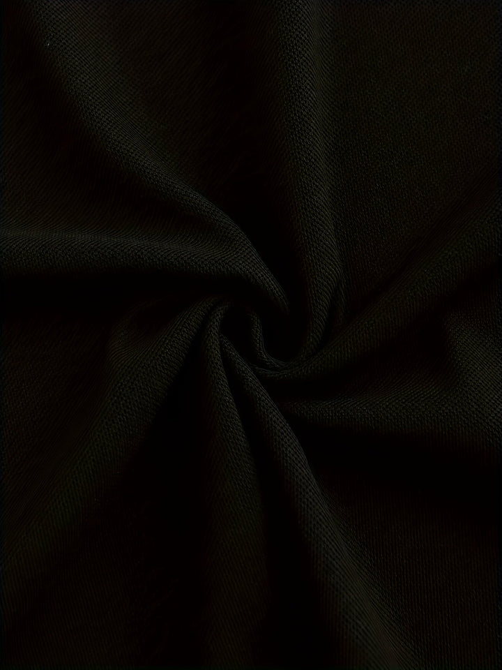Detaljbild som visar tygkvalitet på den långärmade polon