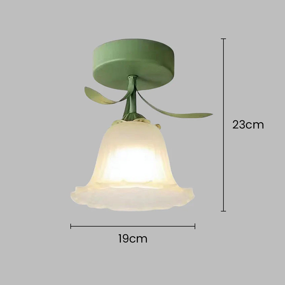 Näruppgång av taklampa i vacker blomdesign med strukturerat glas