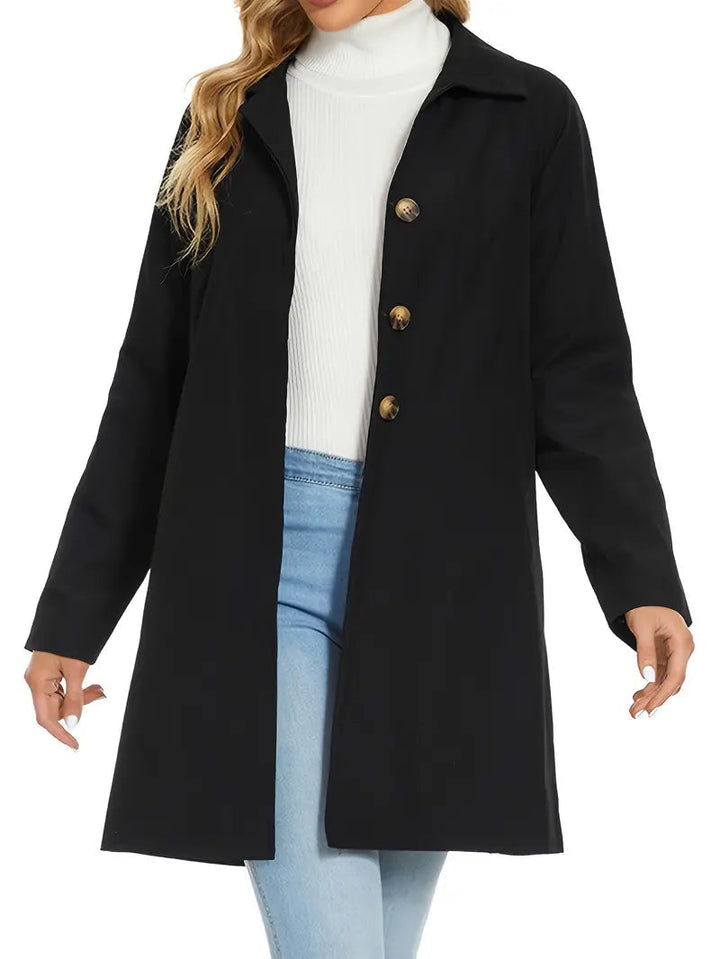 Svart dam lång trenchcoat med matchande bälte för stiliga höstkläder