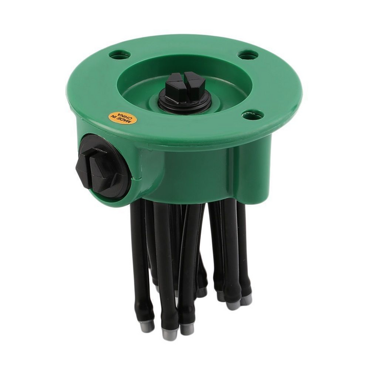 Grön 360-graders sprinkler med svarta flexibla munstycken