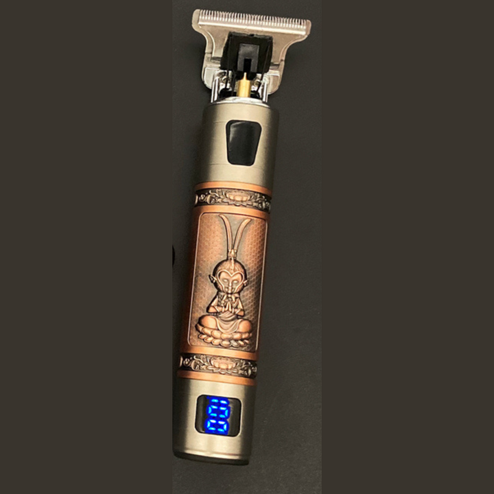 Detaljbild på hår- och skäggtrimmer med Buddha-motiv