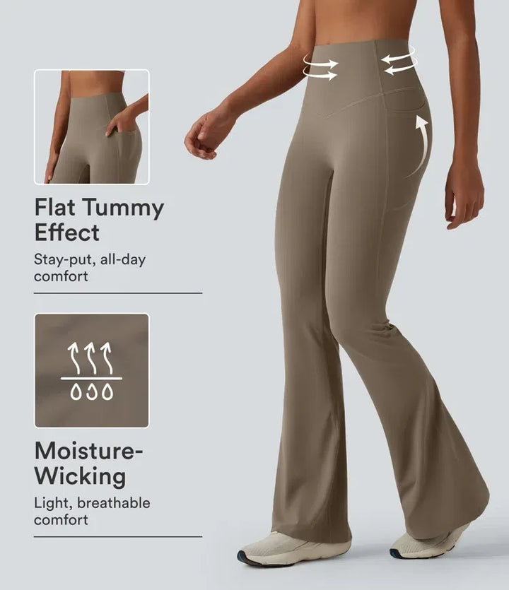 Modell som visar utsvängda yogaleggings med fickor och fuktabsorberande funktion
