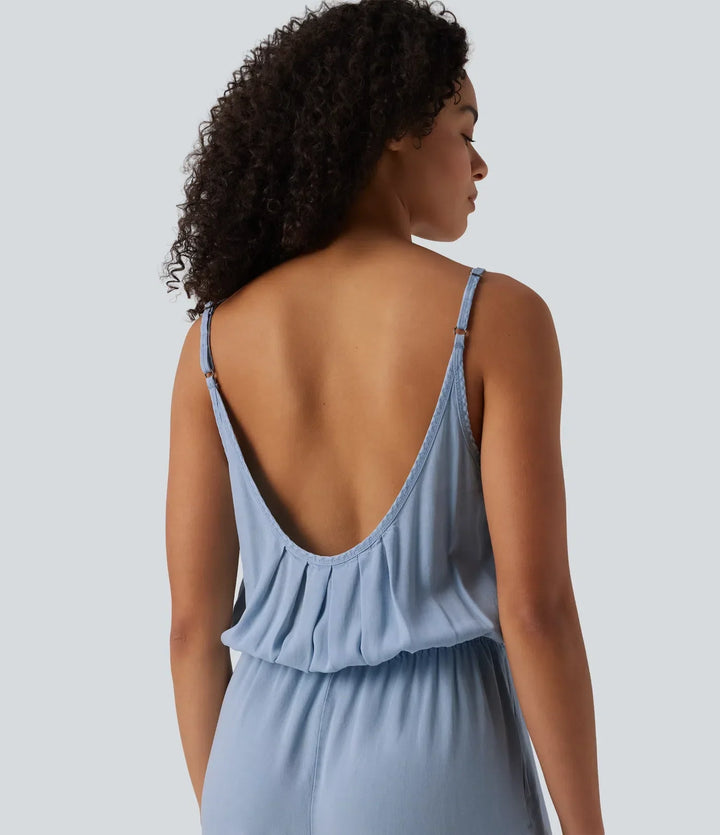 Blå slip jumpsuit med vida ben och fickor för dam