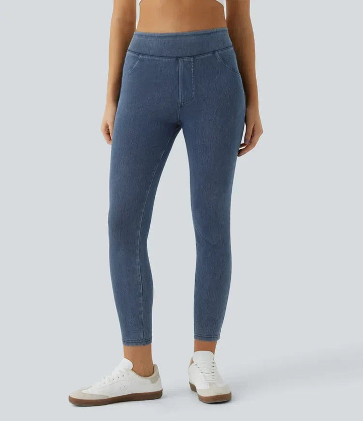 Framifrån av dam i stretchiga vardagsleggings med hög midja
