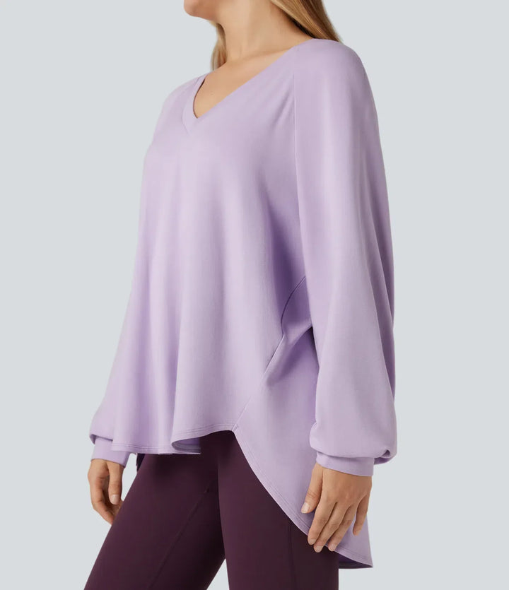 Lila dam sweatshirt med v-ringning och långa ärmar i bekväm modell