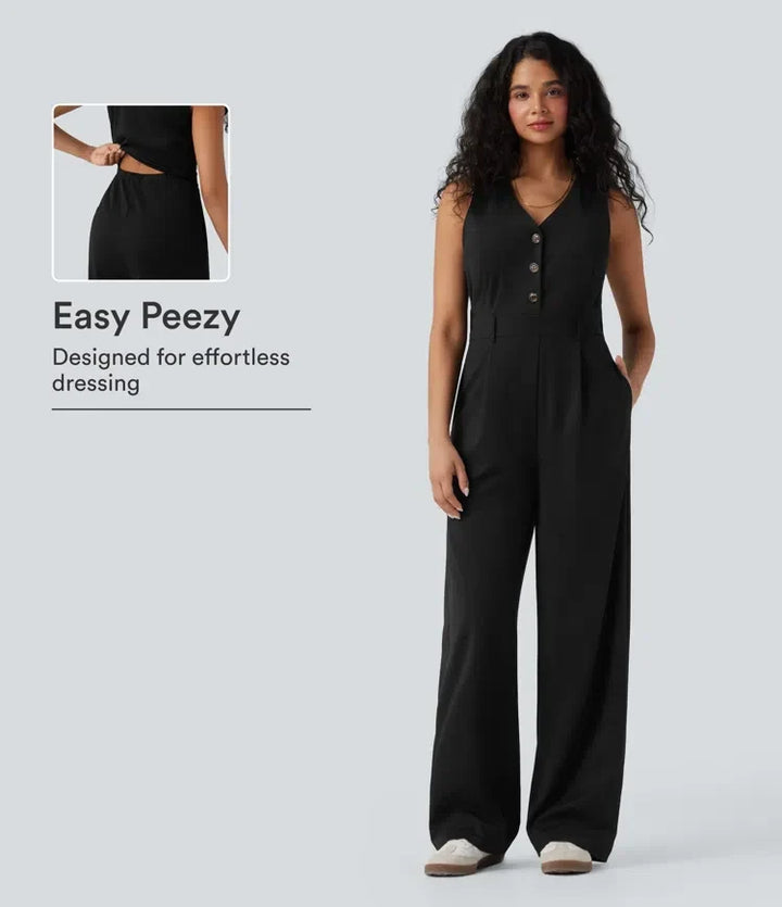 Kvinna som bär svart ärmlös västjumpsuit framifrån med knäppning