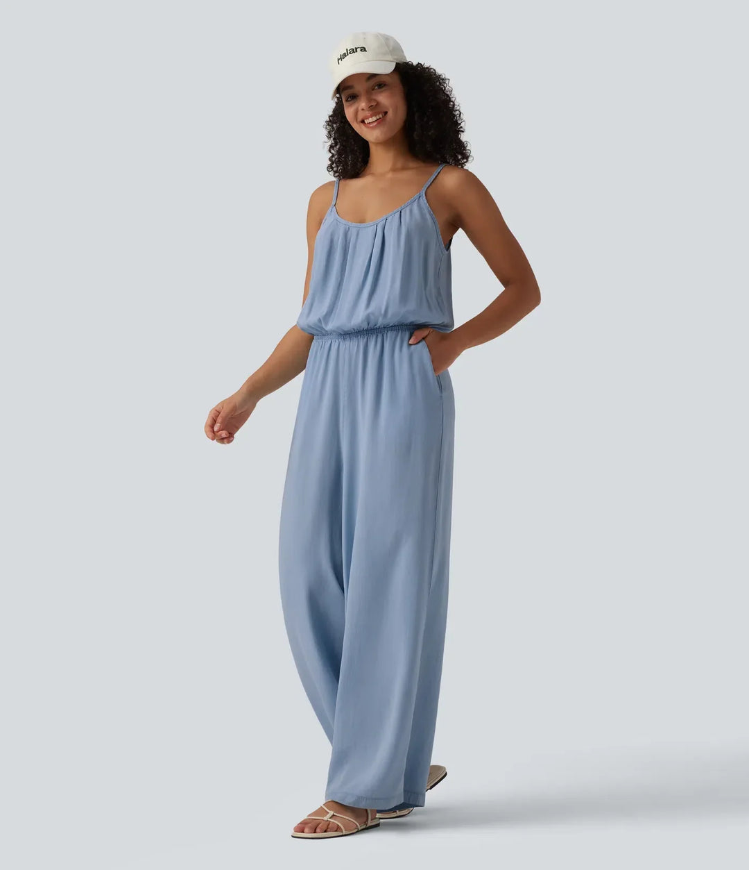 Stilren sommarjumpsuit med vida ben och ärmlös design