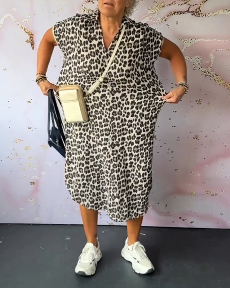Damklänning med leopardtryck, V-ringning och korta ärmar