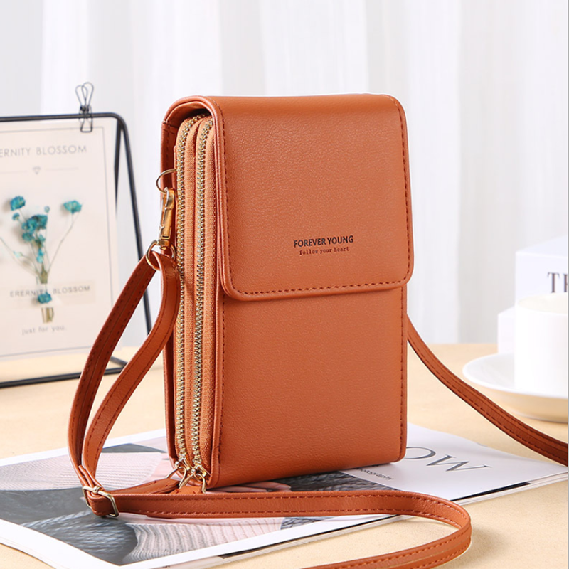 Svart crossbody-väska med justerbar rem för vardagsbruk