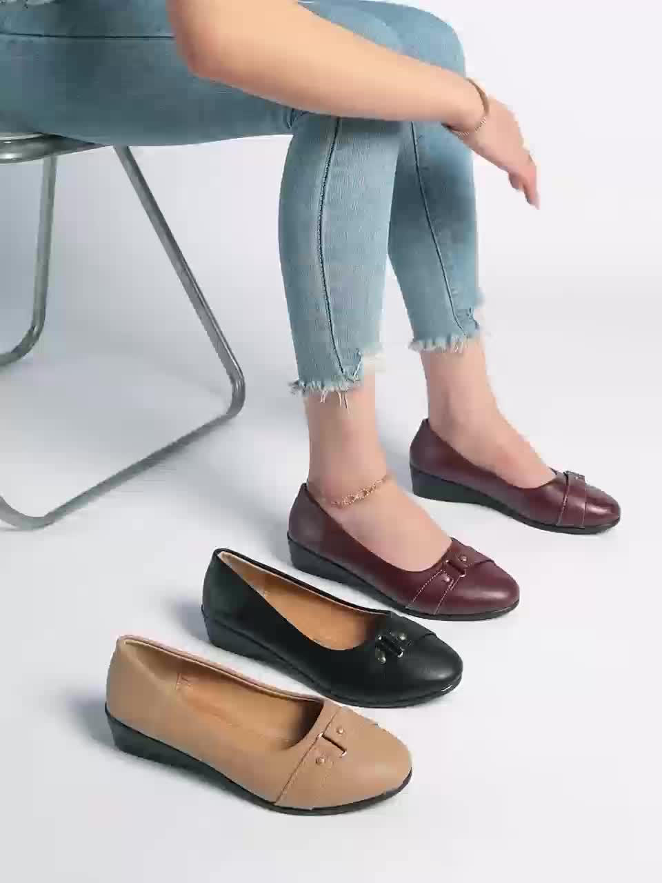 Materialdetalj på eleganta dam ballerinaskor