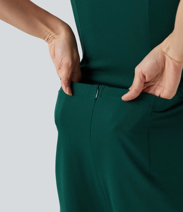 Grön omlott jumpsuit för dam med praktiska sidofickor