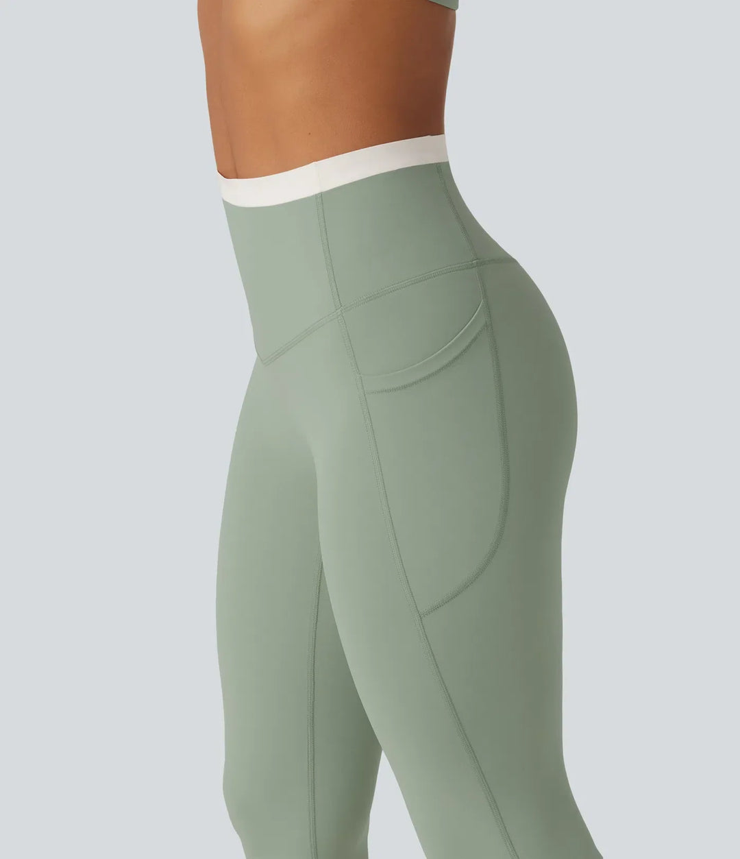 Elastiska yogabyxor med fickor och hög midja för dam