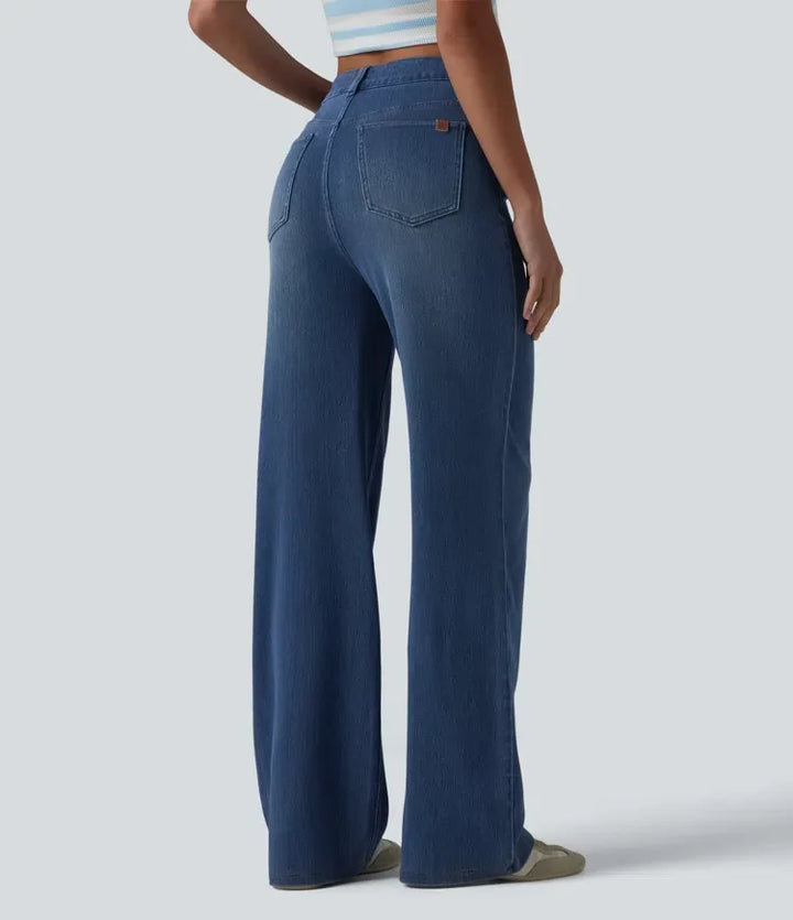 Baksida av skulpterade damjeans med raka ben och fickor