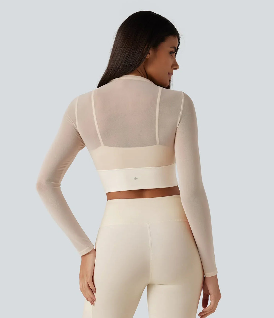 Smidig fitness träningsöverdel i mesh med högfunktionell design