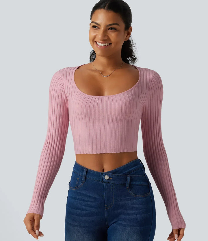 Långärmad rosa crop top med feminin knytdetalj i ryggen